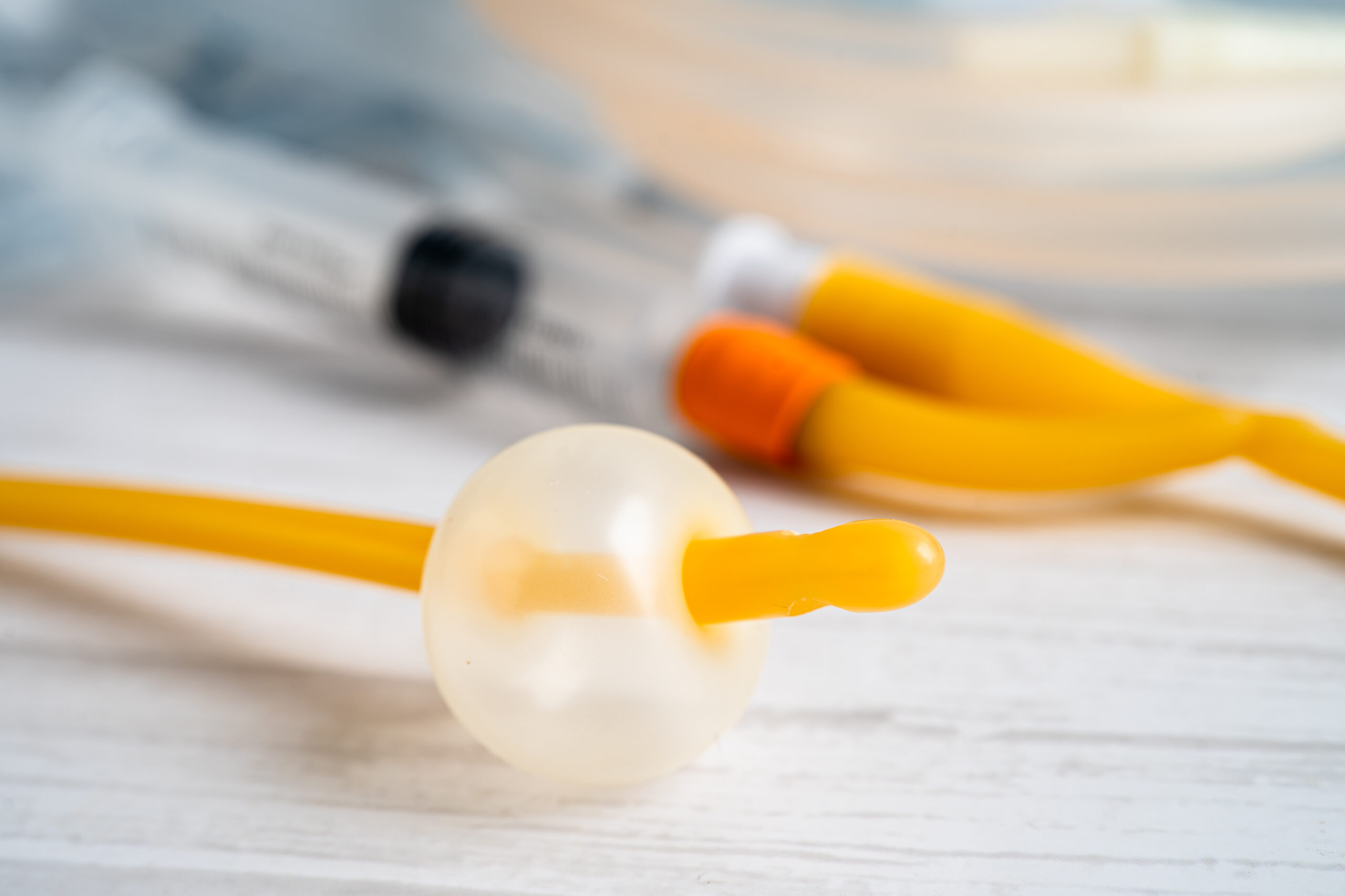 Foley urinary catheter with urine bag for disability or patient
